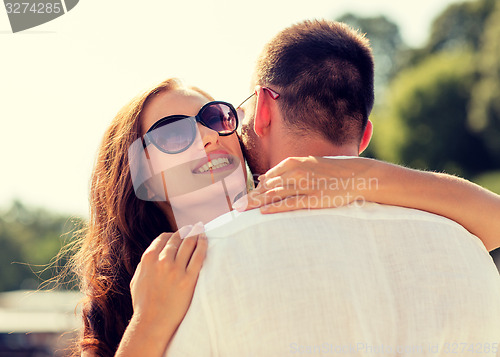 Image of smiling couple in city