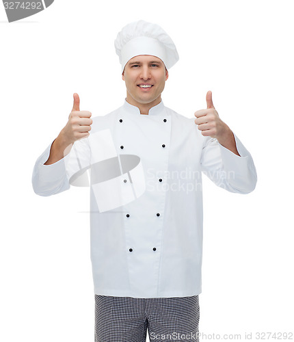 Image of happy male chef cook showing thumbs up