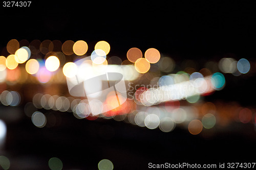 Image of colorful bright lights on dark night background