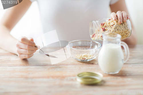 Image of close up of woman eating muesli for breakfast