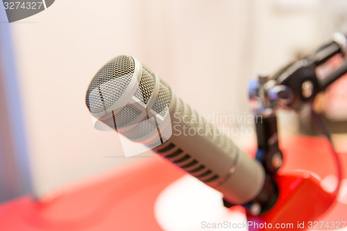 Image of microphone at recording studio or radio station