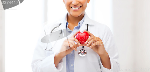 Image of african doctor with heart