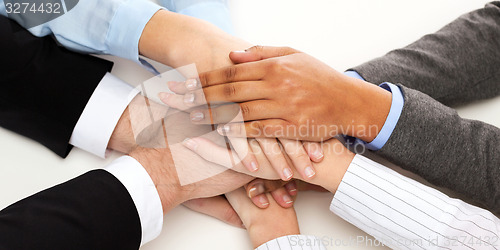 Image of group of businesspeople celebrating victory