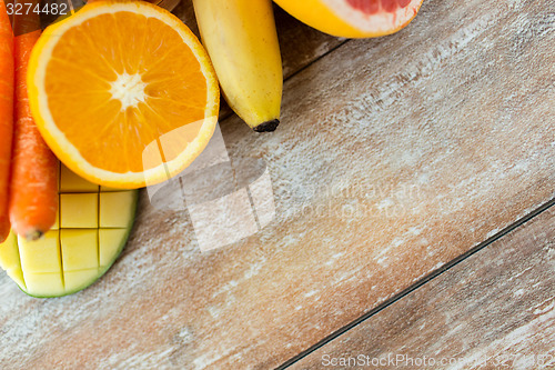 Image of close up of fresh juicy fruits on table
