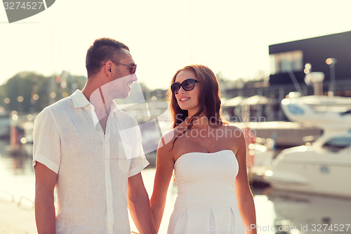 Image of smiling couple in city