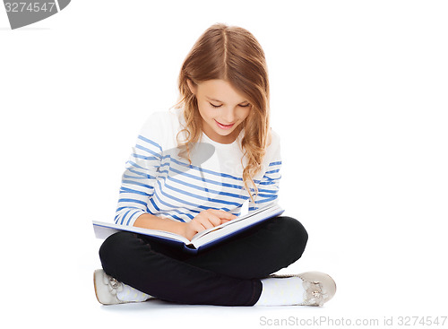 Image of girl reading book