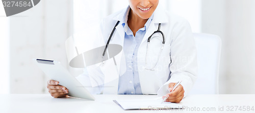 Image of female doctor with tablet pc