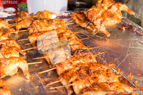 Image of chicken grill at street market