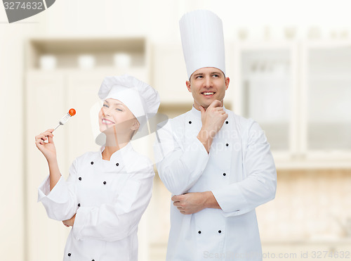 Image of happy male chef cook thinking