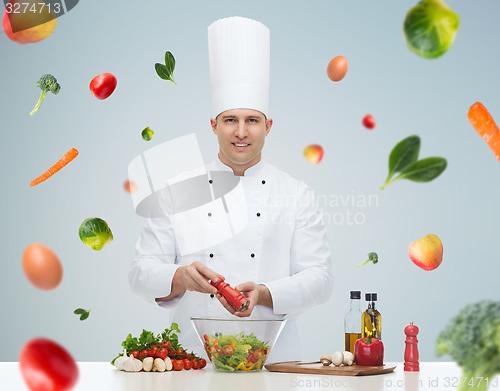 Image of happy male chef cook cooking food