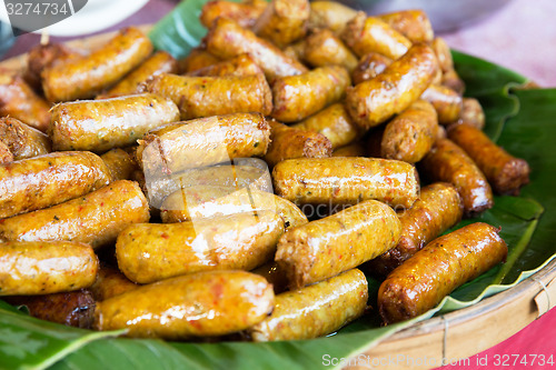 Image of grilled sausages at street market