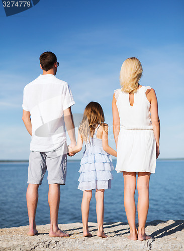 Image of happy family at the seaside