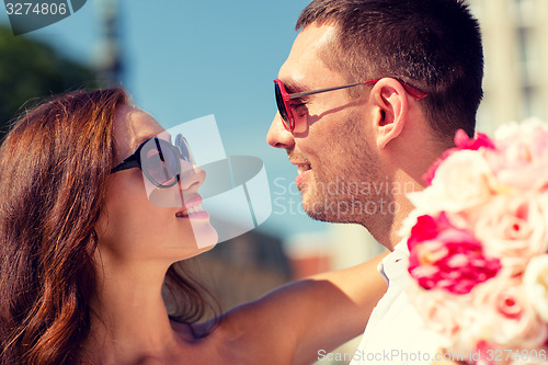 Image of smiling couple in city