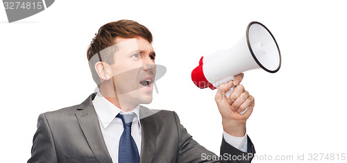 Image of buisnessman with bullhorn or megaphone