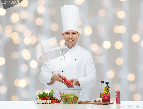 Image of happy male chef cook cooking food