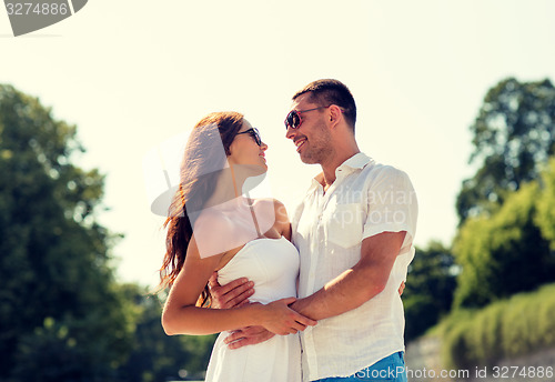 Image of smiling couple in city