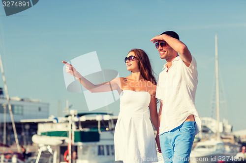 Image of smiling couple in city