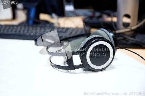 Image of headphones at recording studio or radio station