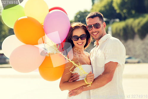 Image of smiling couple in city