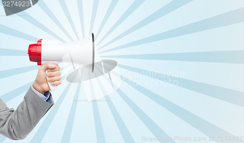 Image of business man hand holding megaphone