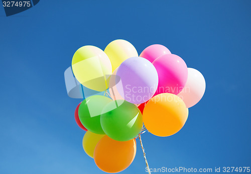 Image of lots of colorful balloons in the sky