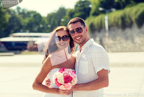 Image of smiling couple in city