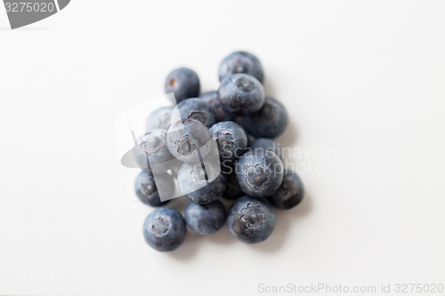 Image of juicy fresh ripe blueberries on white