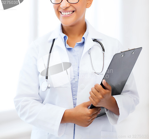 Image of african female doctor in hospital