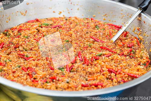 Image of chilly wok or pilaf dish at street market