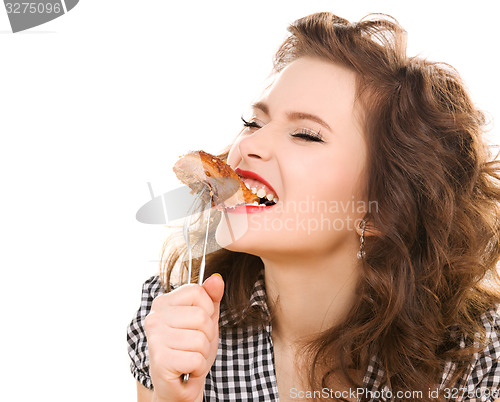 Image of paleo diet concept - woman eating meat