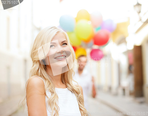 Image of couple with colorful balloons