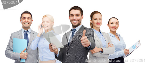 Image of group of smiling businessmen showing thumbs up