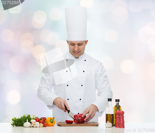 Image of happy male chef cook cooking food