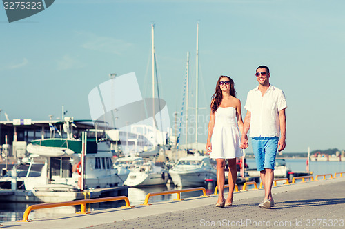 Image of smiling couple in city