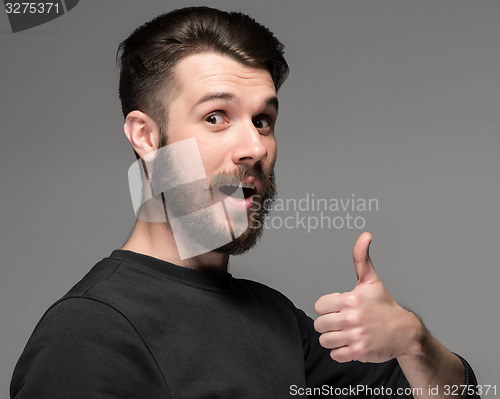 Image of portrait of handsome young smiling man