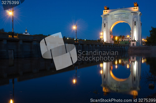 Image of Evening view, with reflection on water arch, to first lock of Volga-Don Canal named after VI Lenina, Volgograd
