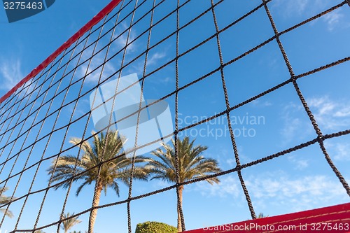 Image of volleyball net on a background blue sky 