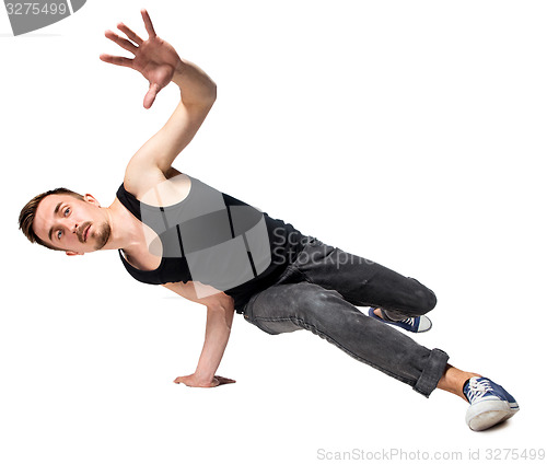 Image of Break dancer doing one handed handstand against a white background