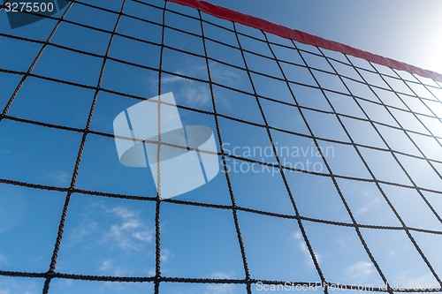 Image of volleyball net on a background blue sky 