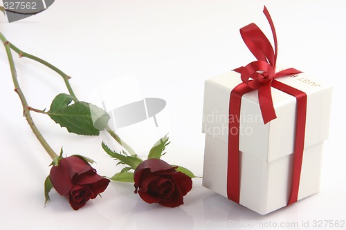 Image of two roses and box