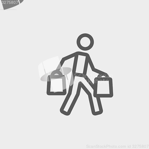 Image of Man carrying shopping bags thin line icon