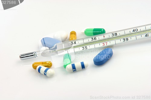 Image of capsules and thermometer