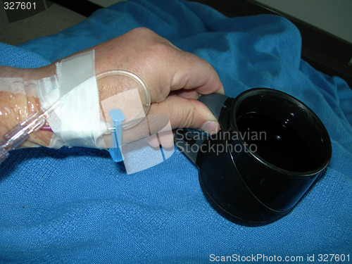 Image of intravenous feed in wrist