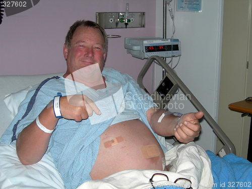 Image of man in hospital after operation