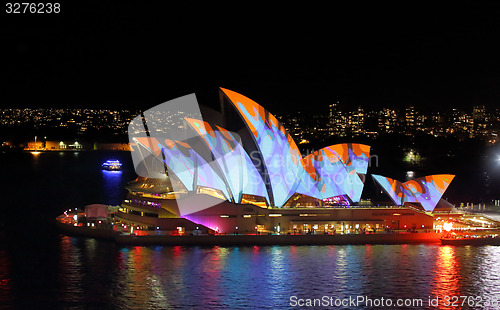 Image of Sydney Opera House in orange and blue during Vivid Sydney