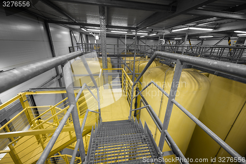 Image of Industrial interior with welded silos