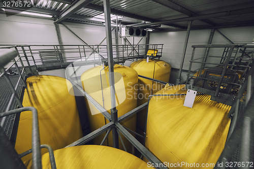 Image of Industrial interior with welded silos