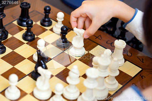 Image of boy playing chess