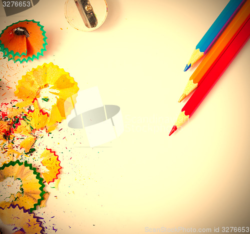 Image of Colored pencil, shavings and sharpener