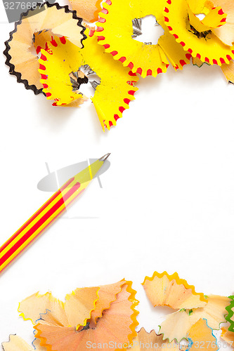 Image of striped pencil and colored shavings